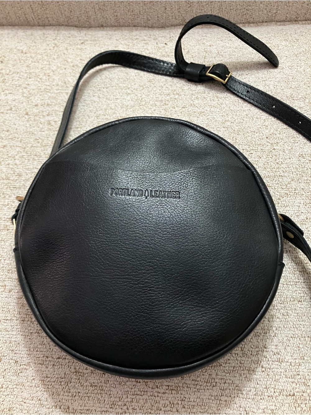 Portland Leather Pebbled Black Round Leather Crossbody